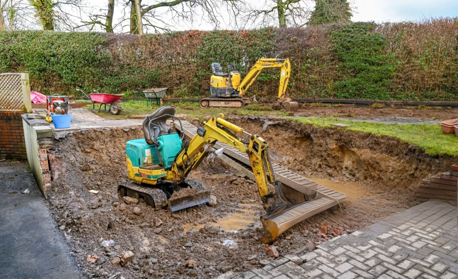 Compact excavation work on a tight backyard lot